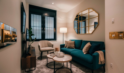 How can keeping spare bulbs of the most-used types prevent rooms from staying dark for days