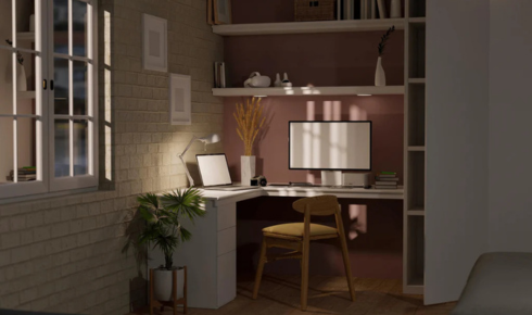 How can placing a narrow console behind a sofa define the living area in an open-plan space