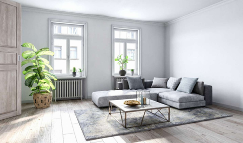 How can planning furniture layout on paper first prevent impulse purchases that don’t fit the room