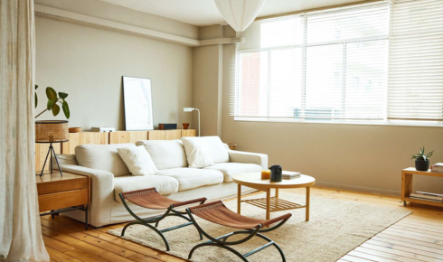 How can using baskets on open shelves make stored items look intentionally styled instead of randomly placed