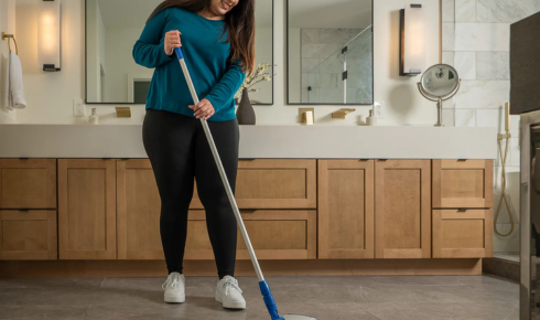 Why does washing reusable cleaning cloths separately from regular laundry keep them more effective